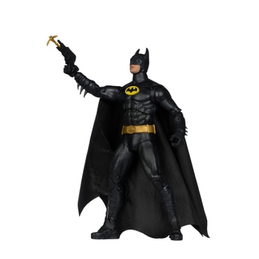 Batman holding his iconic grapnel gun