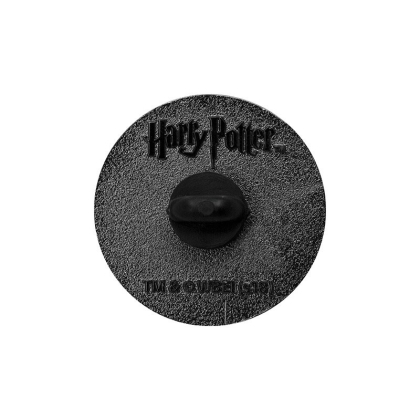 Hogwarts suitcase pin attached to a backpack