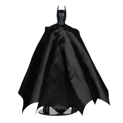 Rear view of the figure showcasing the cape